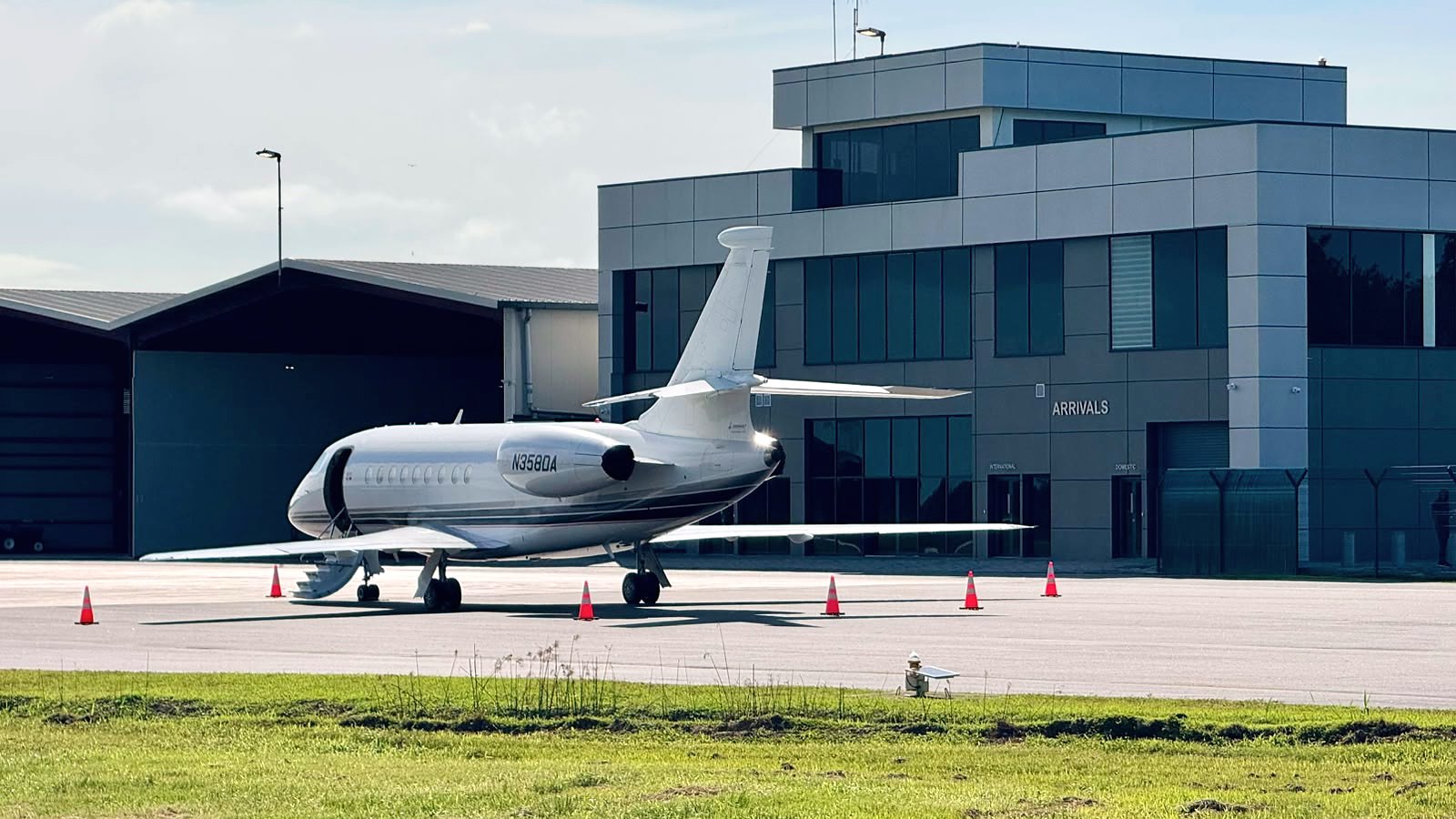 A business jet on the apron in front of the EAG terminal