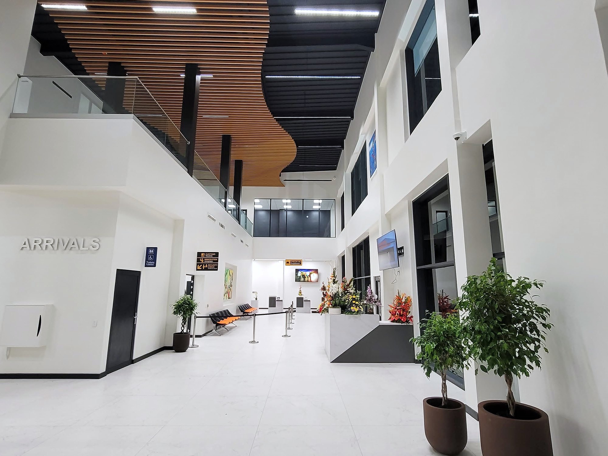 The EAG arrivals hall with the timber-slat ceiling