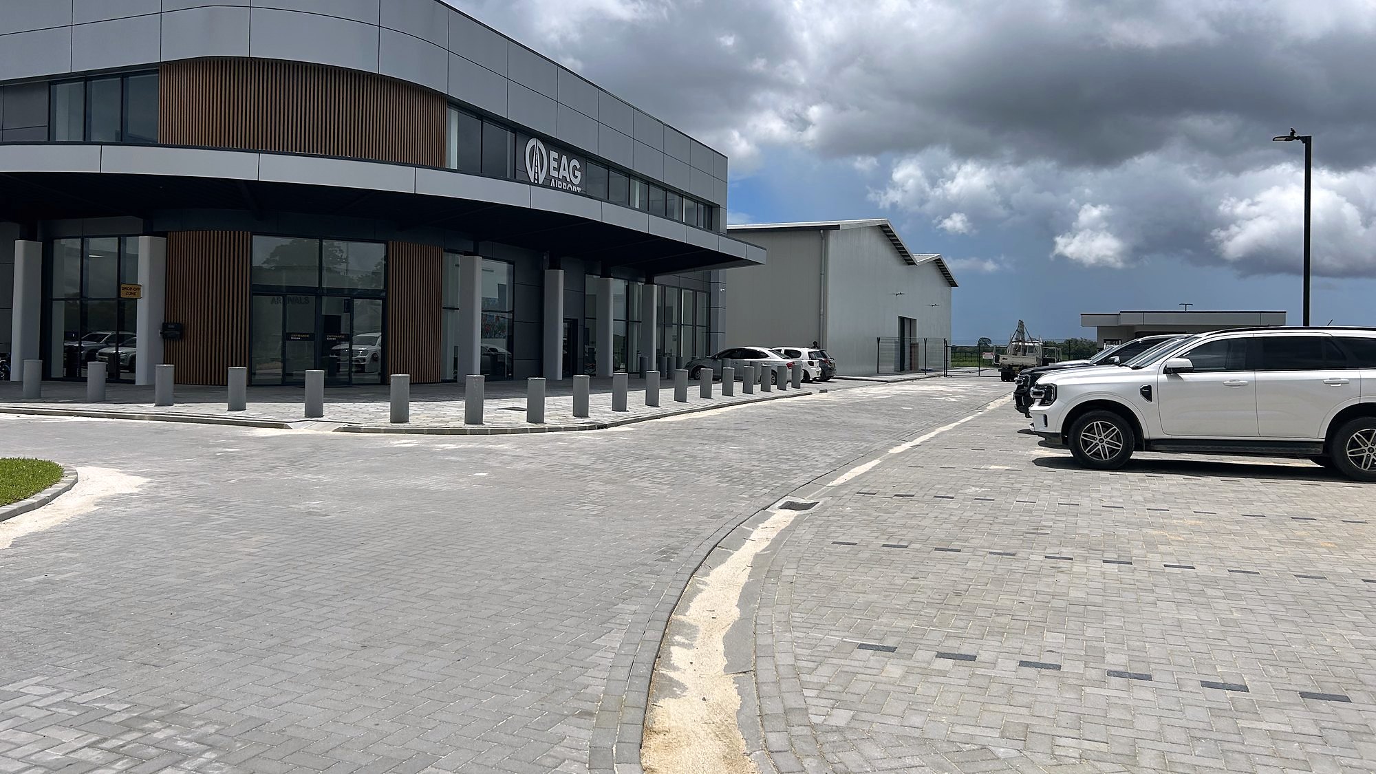 The EAG commercial building with the parking area alongside