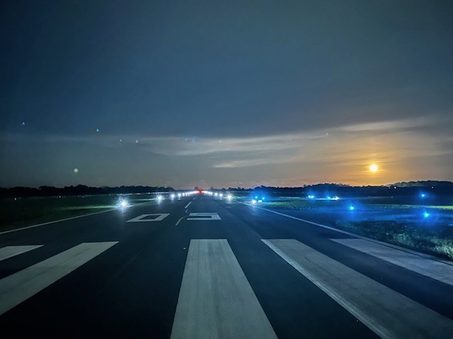 Runway edge and threshold lighting at EAG at night